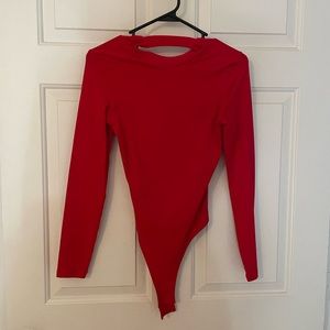 Red, backless Bodysuit.